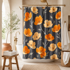 A dark grey shower curtain with bold orange poppy pattern in a Mediterranean style bathroom, featuring arched doorway, terracotta pot, gold standing faucet, and woven basket.