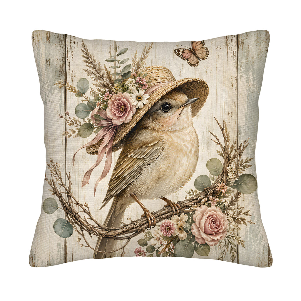 A square decorative throw pillow cover isolated on a pure white background, featuring a highly detailed vintage watercolor illustration of a cute songbird wearing a floral straw hat perched on a rose branch against a rustic wood plank pattern.