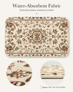 Water-absorbent traditional floral welcome mat with detailed close-ups showing water droplets on the textured surface and mat edge thickness.