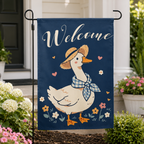 Welcome goose garden flag shown close up by a front entry.