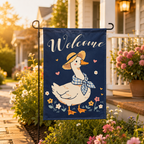 Welcome goose garden flag displayed in a sunny front porch garden.