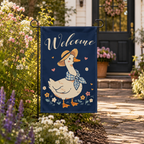 Welcome goose garden flag styled near a sunny front porch.