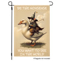 Whimsical wizard possum riding a goose garden flag with playful quote.